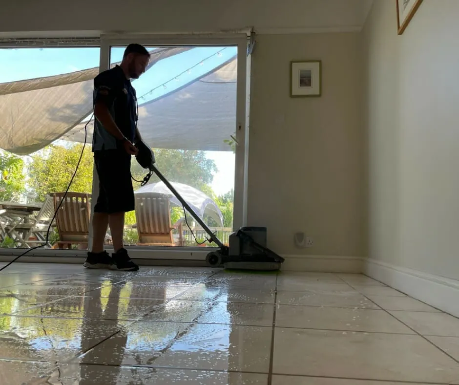 How do professionals clean tiled floors?
