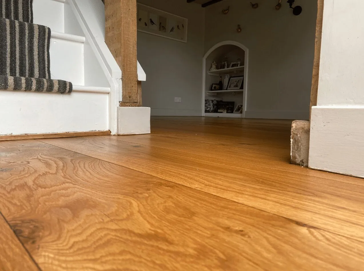 How do I tell if my wood floor is solid or engineered?