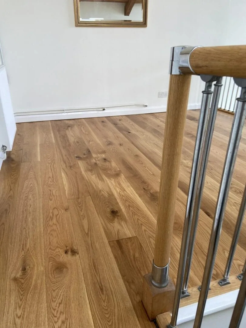 What treatment can be used to stop my wood floor from getting white marks on it from accidental spills etc?