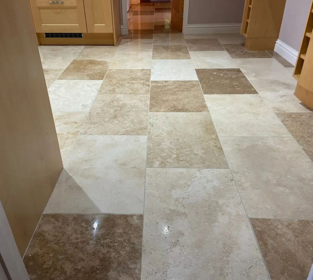 How do I remove an oil stain from my stone floor?